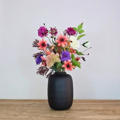 Zijden boeket met oranje/bruine, paarse en roze kleuren