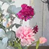 Zijden roze bloemen in boeket