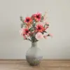 Zijden boeket met oranje en roze kunstbloemen