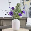 Zijden boeket met paarse, groene en witte bloemen